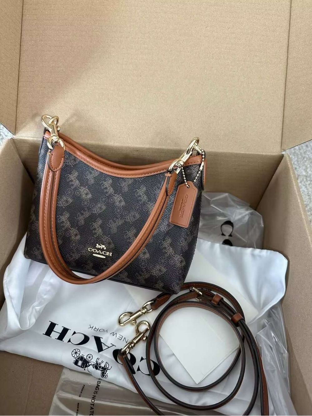 Coach Brown Signature Canvas Shoulder Bag with Tan Trim and Gold Hardware